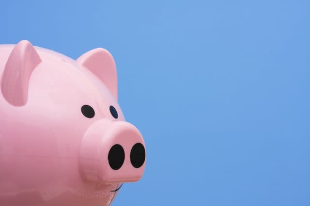 piggy bank on blue background...