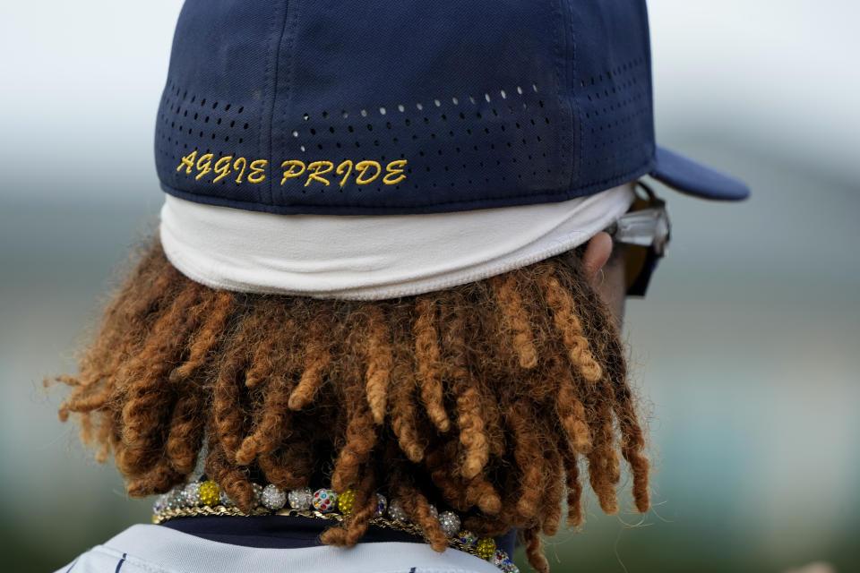 North Carolina A&T University outfielder TJ Ash wears an Aggies Pride cap at the Andre Dawson Classic tournament, Friday, Feb. 23, 2024, at the Jackie Robinson Training Complex, in Vero Beach, Fla. The percentage of Black major league players has been declining for decades and remains historically low, but there are signs of improvement in the league's player development pipeline. (AP Photo/Lynne Sladky)