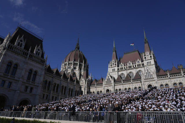 Faithful wait for Pope Francis arrival for a mass in Kossuth Lajos Square in Budapest, Hungary, Sunday, April 30, 2023. (AP Photo/Andrew Medichini)