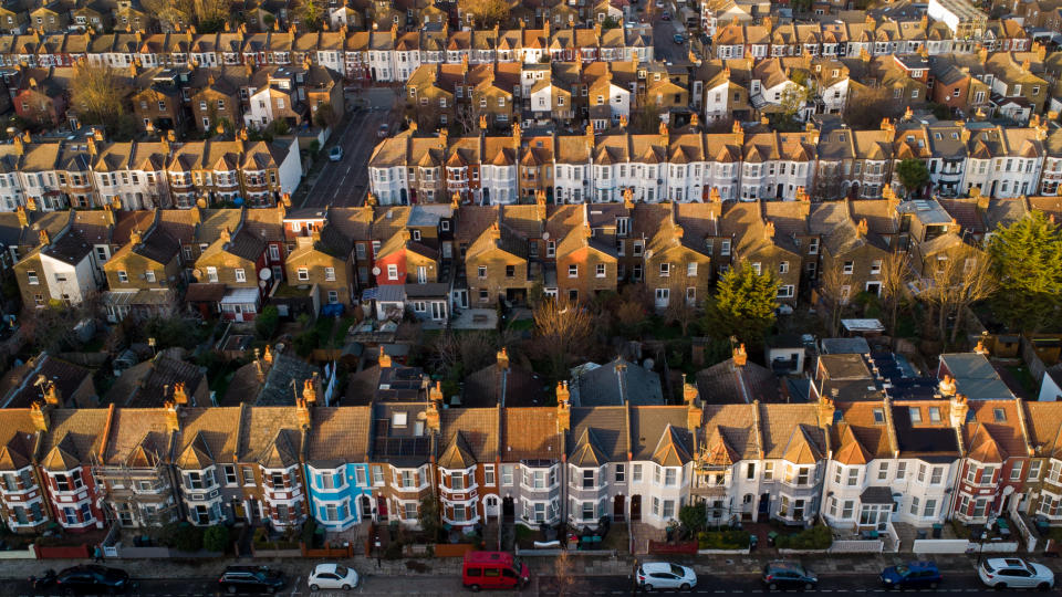 mortgage LONDON, UNITED KINGDOM - DECEMBER 20: An aerial view of terraced houses in north London, Britain on December 20, 2022. The UK Government is extending the mortgage guarantee scheme for first-time home buyers or those with small deposits until the end of 2023. Halifax is predicting an 8 per cent decline in house prices in 2023. (Photo by Dinendra Haria/Anadolu Agency via Getty Images)