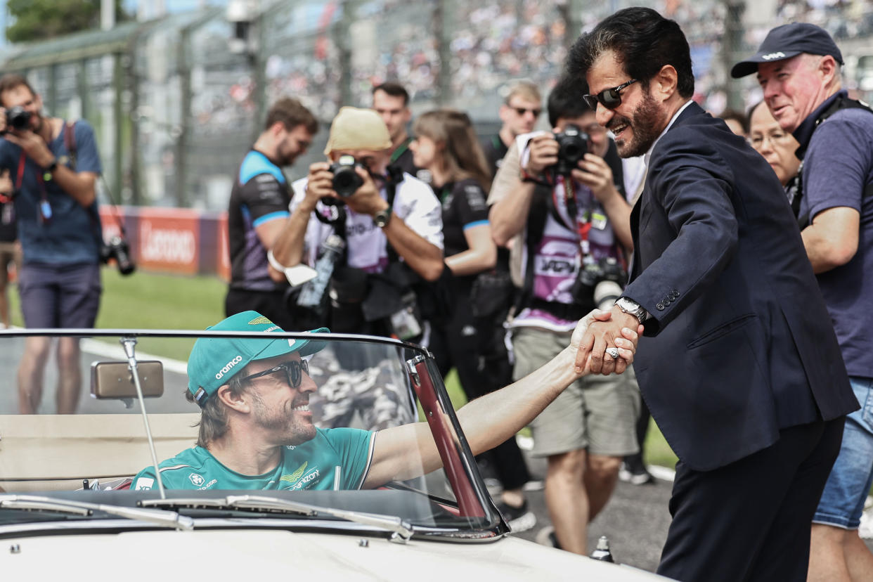 SUZUKA, JAPAN - SEPTEMBER 24: Fernando Alonso of Spain and Aston Martin Aramco Cognizant F1 Team and Mohammed Ben Sulayem of UAE and the FIA during the F1 Grand Prix of Japan at Suzuka Circuit on September 24, 2023 in Suzuka, Japan. (Photo by Qian Jun/MB Media/Getty Images)