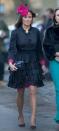 <p>For the wedding of Katie Percy and Patrick Valenine, held at St. Michael’s Church in Alnwick in February 2011, Pippa wore a black and fuchsia ensemble. <em>(Photo: PA)</em> </p>