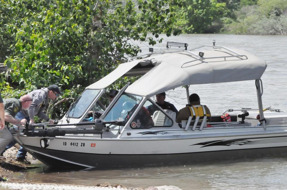 Family members and authorities search for Everette Jackson of Raceland on Tuesday in the Payette River near Emmett, Idaho. The 21-year-old Raceland man fell off a raft into the river on June 11.