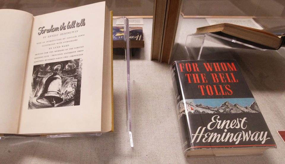 At left is a 1942 edition of "For Whom the Bell Tolls" with an introduction by Sinclair Lewis and on the right is a 1940 copy on display at the University of South Carolina in Columbia, S.C. Tuesday Sept. 25, 2012. The University of South Carolina Libraries is now home to the most complete collection of Ernest Hemingway's published work, thanks to a newly acquired collection of more than 1,200 items of the 20th century American writer. (AP Photo/The State,Tim Dominick ) ALL LOCAL MEDIA OUT, (TV, ONLINE, PRINT)