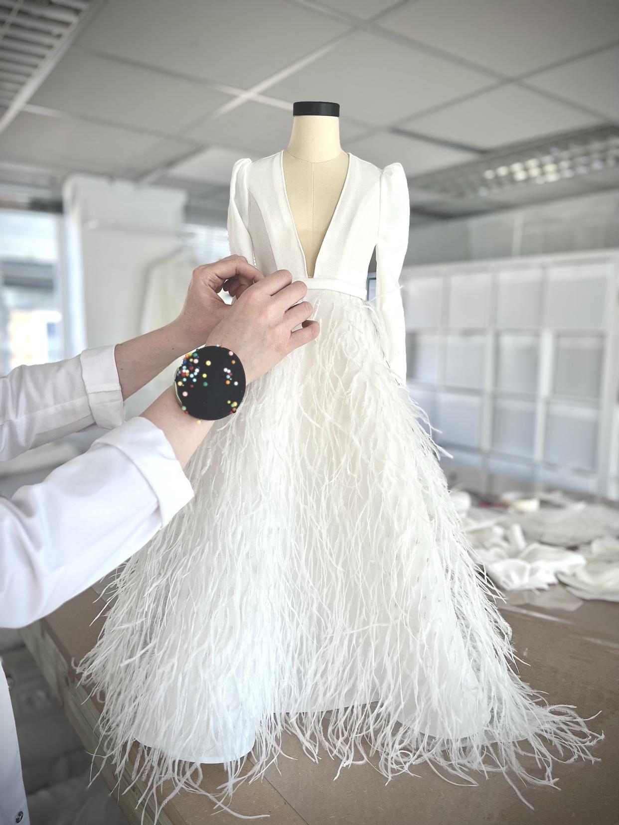 The company transforms silk robes and slips, to dress miniatures or newborn gowns. Photo: The Modiste