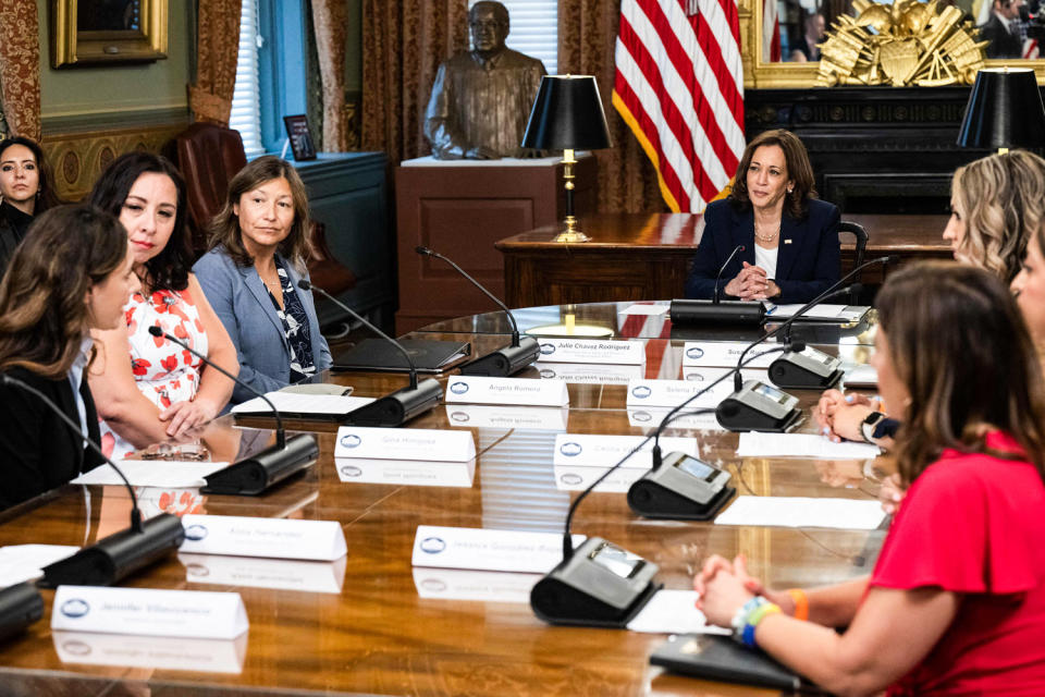 Kamala Harris sits at a roundtable with legislators (Saul Loeb / AFP - Getty Images file)