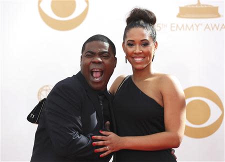 Actor Tracy Morgan from NBC's sitcom "30 Rock" and wife, Sabina Morgan, arrive at the 65th Primetime Emmy Awards in Los Angeles September 22, 2013. REUTERS/Mario Anzuoni (UNITED STATES Tags: ENTERTAINMENT) (EMMYS-ARRIVALS)