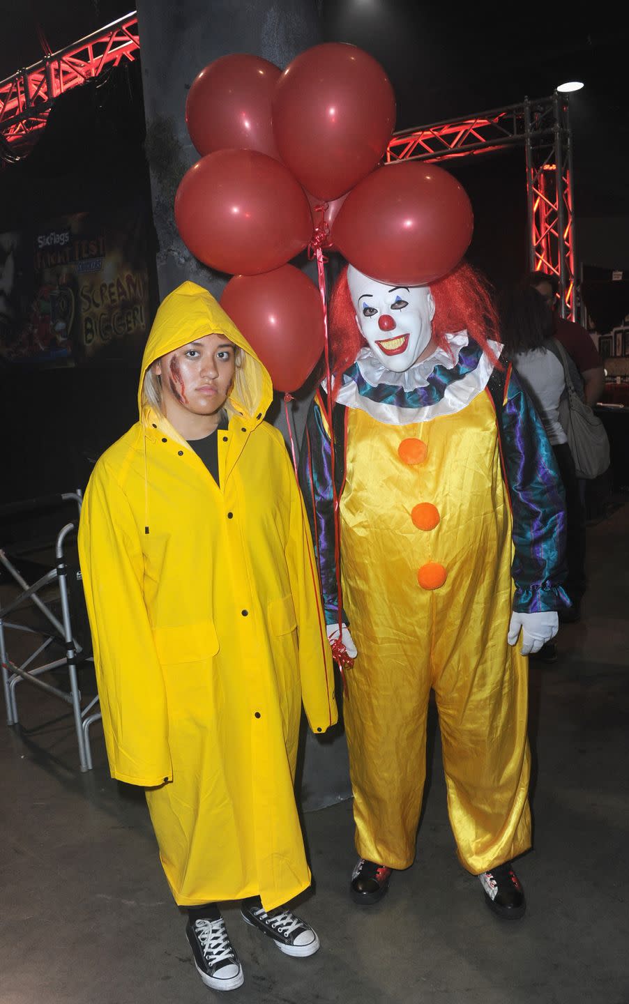 couples halloween costumes georgie and pennywise from 'it'