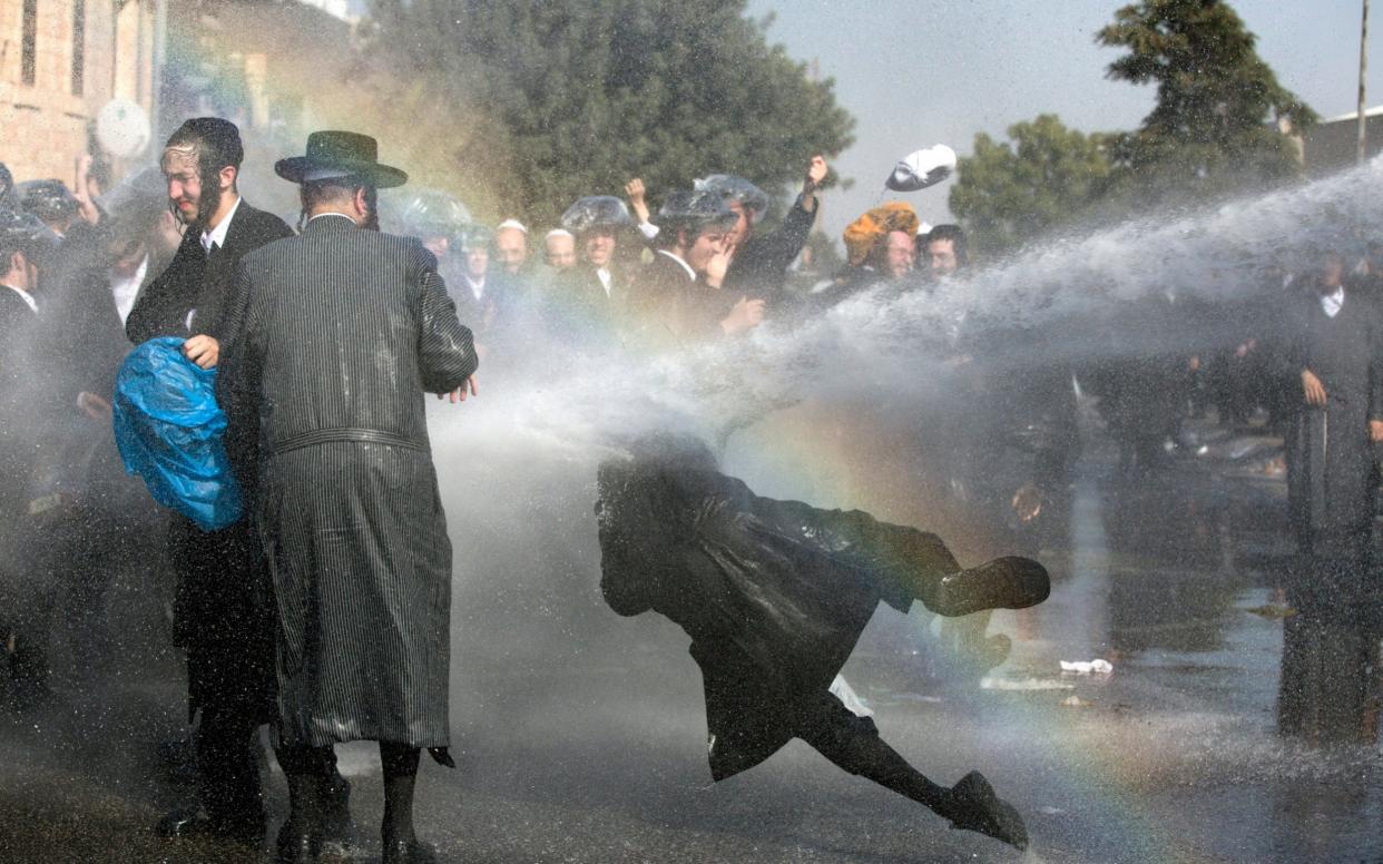 Ultra-Orthodox Jews protest against army recruitment - EPA