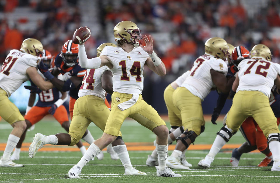 FILE - Boston College quarterback Emmett Morehead (14) throws a pass during the first half of the team's NCAA college football game against Syracuse in Syracuse, N.Y., Oct. 30, 2021. Boston College opens their season at home against Northern Illinois on Sept. 2. (AP Photo/Joshua Bessex, File)