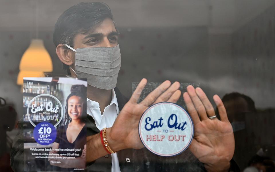 Rishi Sunak promotes the Eat Out to Help Out scheme in Scotland last month - Jeff J Mitchell/PA