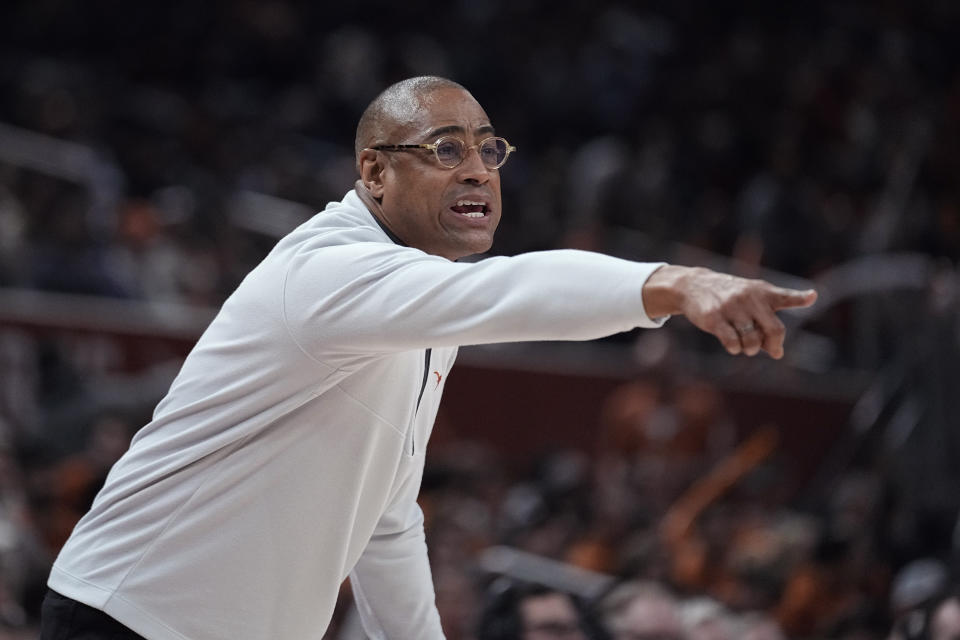 Texas interim coach Rodney Terry signals to players during the first half of an NCAA college basketball game against Texas A&M-Commerce in Austin, Texas, Tuesday, Dec. 27, 2022. (AP Photo/Eric Gay)