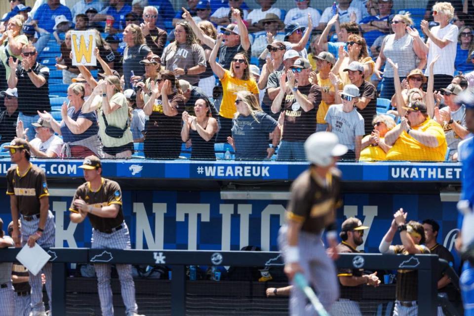 Western Michigan fans celebrate an RBI hit by outfielder Dylan Nevar (15) during the fifth inning as the Broncos tried to rally Friday. A crowd of 5,861 watched the noon game at Kentucky Proud Park