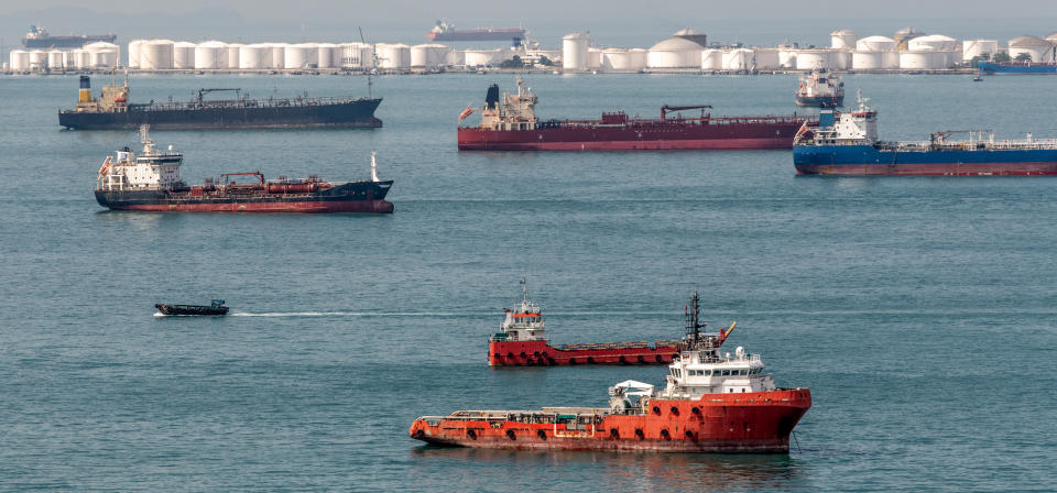 Oil tank farm and ships off the coast of Singapore