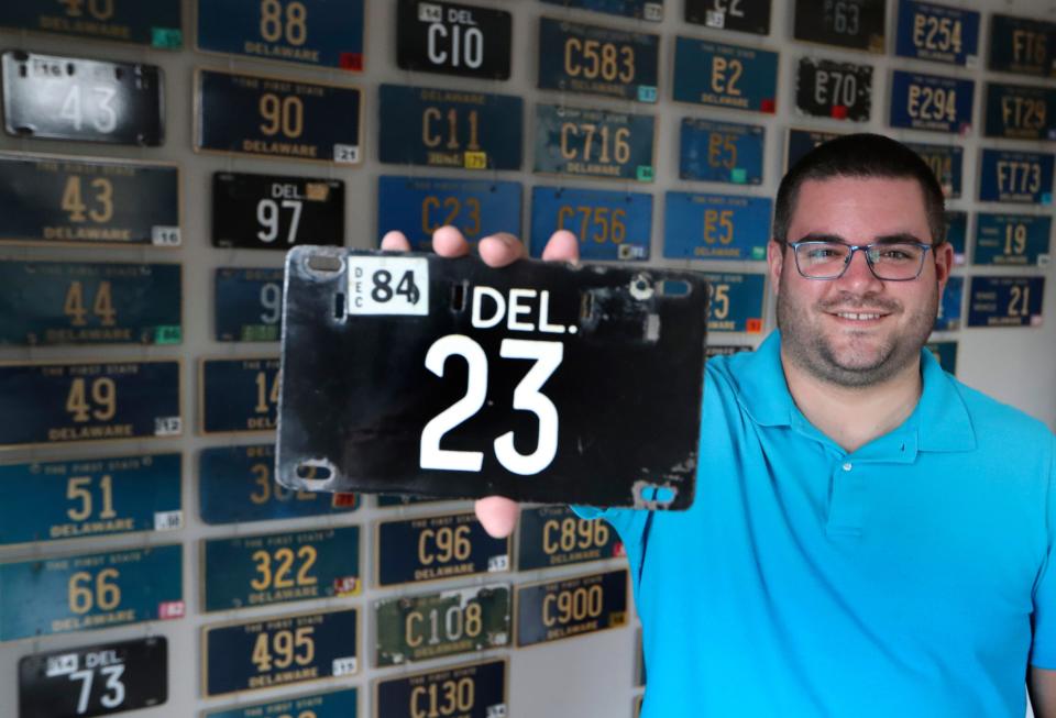 Jordan Irazabal of Wilmington is an aficionado of Delaware's low number license plates and has been collecting photos of them for 17 years.