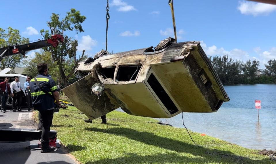 Miami-Dade police investigators began pulling submerged vehicles from a lake in Doral, Florida on Aug. 8, 2023, after volunteer investigators said they found dozens of cars and trucks in the lake.