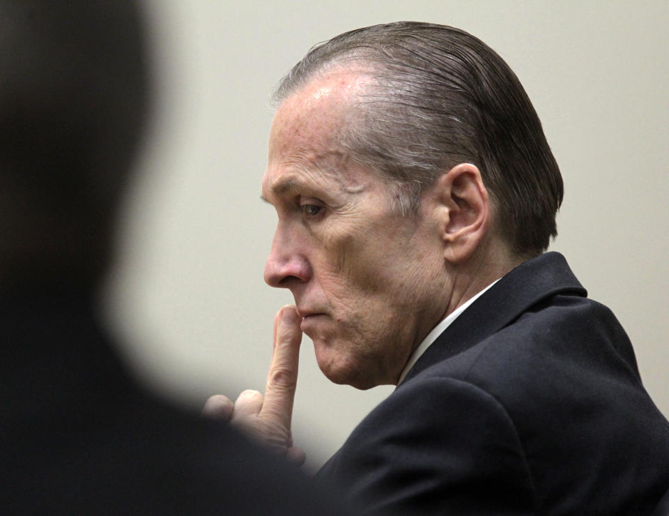 FILE - This Nov. 7, 2013, file photo, shows Martin MacNeill listening to Gypsy Willis testify during his murder trial in 4th District Court in Provo, Utah. The attorney for MacNeill, a doctor found dead Sunday, April 9, 2017, who was in prison for drugging his beauty queen wife and leaving her to die, says he suspects suicide. Officials say correctional officers found 60-year-old MacNeill unresponsive Sunday morning near the greenhouse of the Olympus Facility at the Utah State Prison. (Al Hartmann/The Salt Like Tribune via AP, Pool, File)