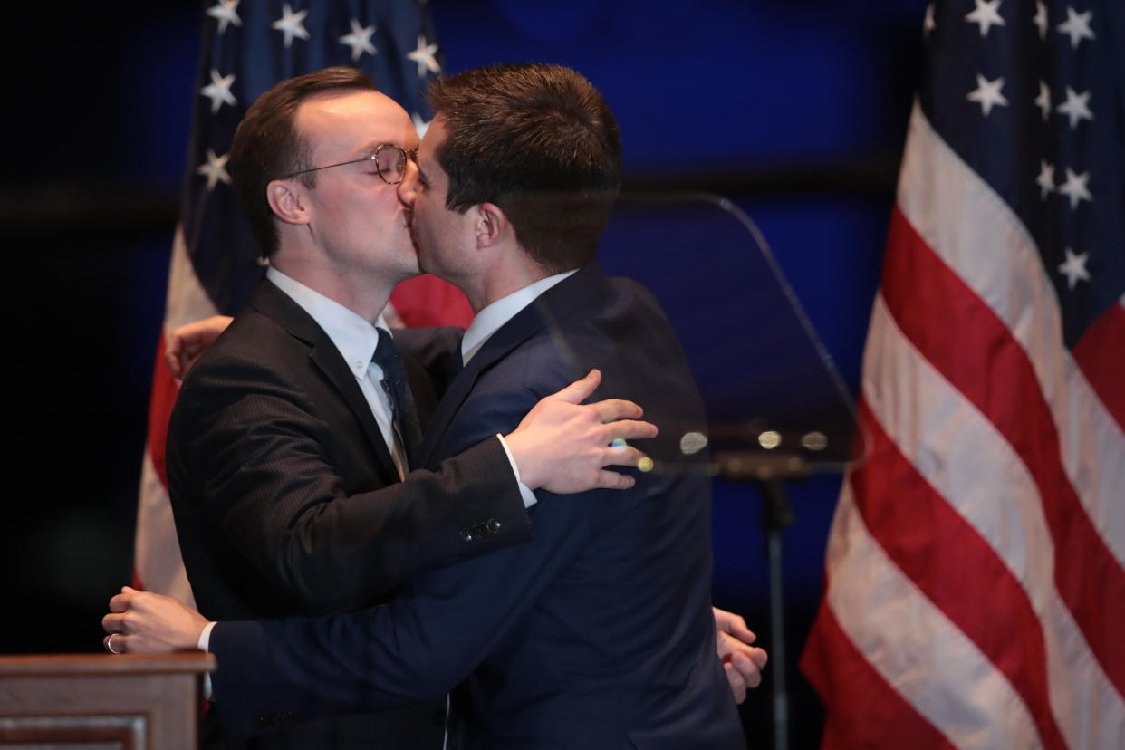 SOUTH BEND, INDIANA - MARCH 01: Former South Bend, Indiana Mayor Pete Buttigieg kisses his husband Chasten after Chasten introduced him before a speech where he announced he was ending his campaign to be the Democratic nominee for president during a speech at the Century Center on March 01, 2020 in South Bend, Indiana. Buttigieg was the first openly-gay candidate for president. (Photo by Scott Olson/Getty Images)