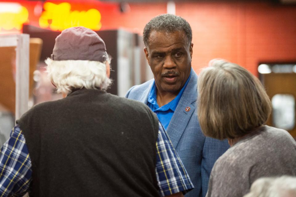 Rep. Sam McKenzie chats with voters at the Knox County Democratic Party’s election night party.