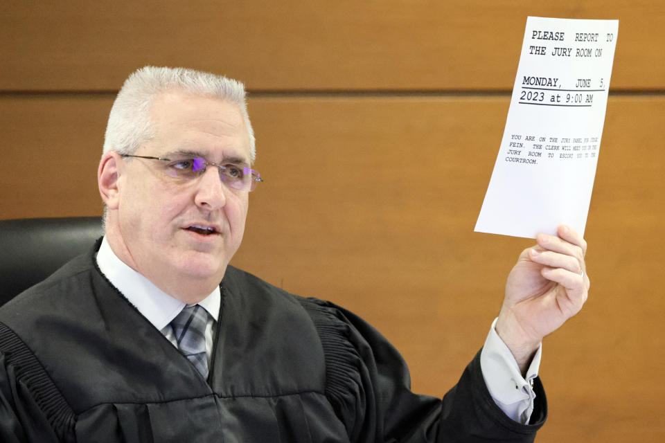 Judge Martin Fein instructs potential jurors in the case of former Marjory Stoneman Douglas High School School Resource Officer Scot Peterson at the Broward County Courthouse in Fort Lauderdale on Wednesday, May 31, 2023. Jury selection began in the trial of the former Florida sheriff's deputy charged with failing to confront the shooter who killed 14 students and three staff members at a Parkland high school five years ago. (Amy Beth Bennett/South Florida Sun-Sentinel via AP, Pool)