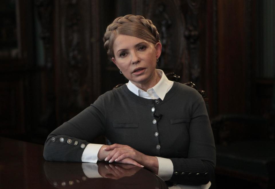 Former Ukrainian Prime Minister and candidate for the upcoming presidential elections Yulia Tymoshenko speaks during an interview with The Associated Press in Kiev, Ukraine, Saturday, April 26, 2014. Tymoshenko says Ukraine “must be a member of NATO” in order to protect itself from Russian aggression. While Tymoshenko has not previously backed NATO membership publicly, she and other Ukrainian politicians have ramped up the tough rhetoric as pro-Russia militias seized police stations and government buildings across eastern Ukraine. (AP Photo/Sergei Chuzavkov)