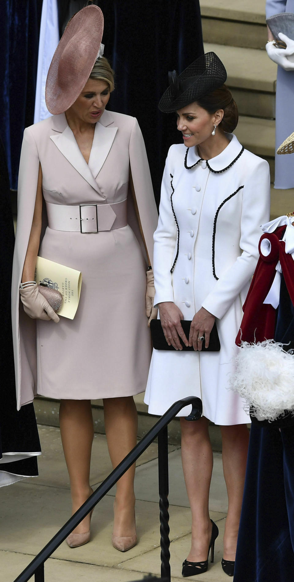 Queen Maxima of the Netherlands, left, and Kate, Duchess of Cambridge after the annual Order of the Garter Service at St George's Chapel, Windsor Castle in Windsor, England, Monday, June 17, 2019. (Ben Stansall/Pool Photo via AP)