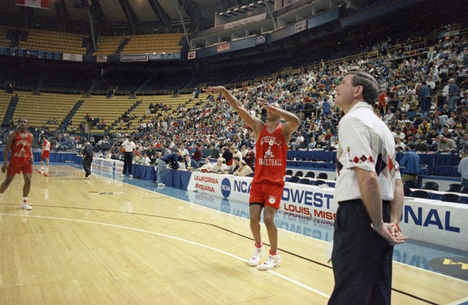 Louisville coach Denny Crum watches Clifford Rozier put up a basket during practice, Wednesday, March 25, 1993, St. Louis, Mo. Crums Cardinals face Indiana Thursday in the first round of the NCAA Midwest Regionals. 