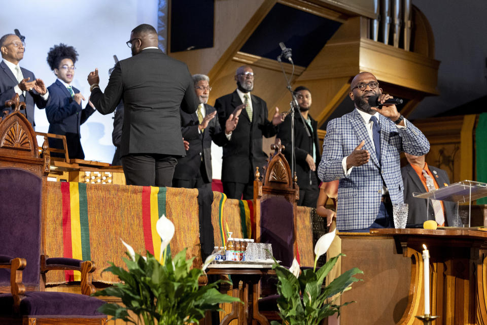 Rev. William H. Lamar IV leads a Palm Sunday service at the Metropolitan AME Church in Washington, Sunday, March 24, 2024. Lamar says their churches are still feeling the pandemic’s impact on attendance, even as they have rolled out robust online worship options to reach people. (AP Photo/Amanda Andrade-Rhoades)