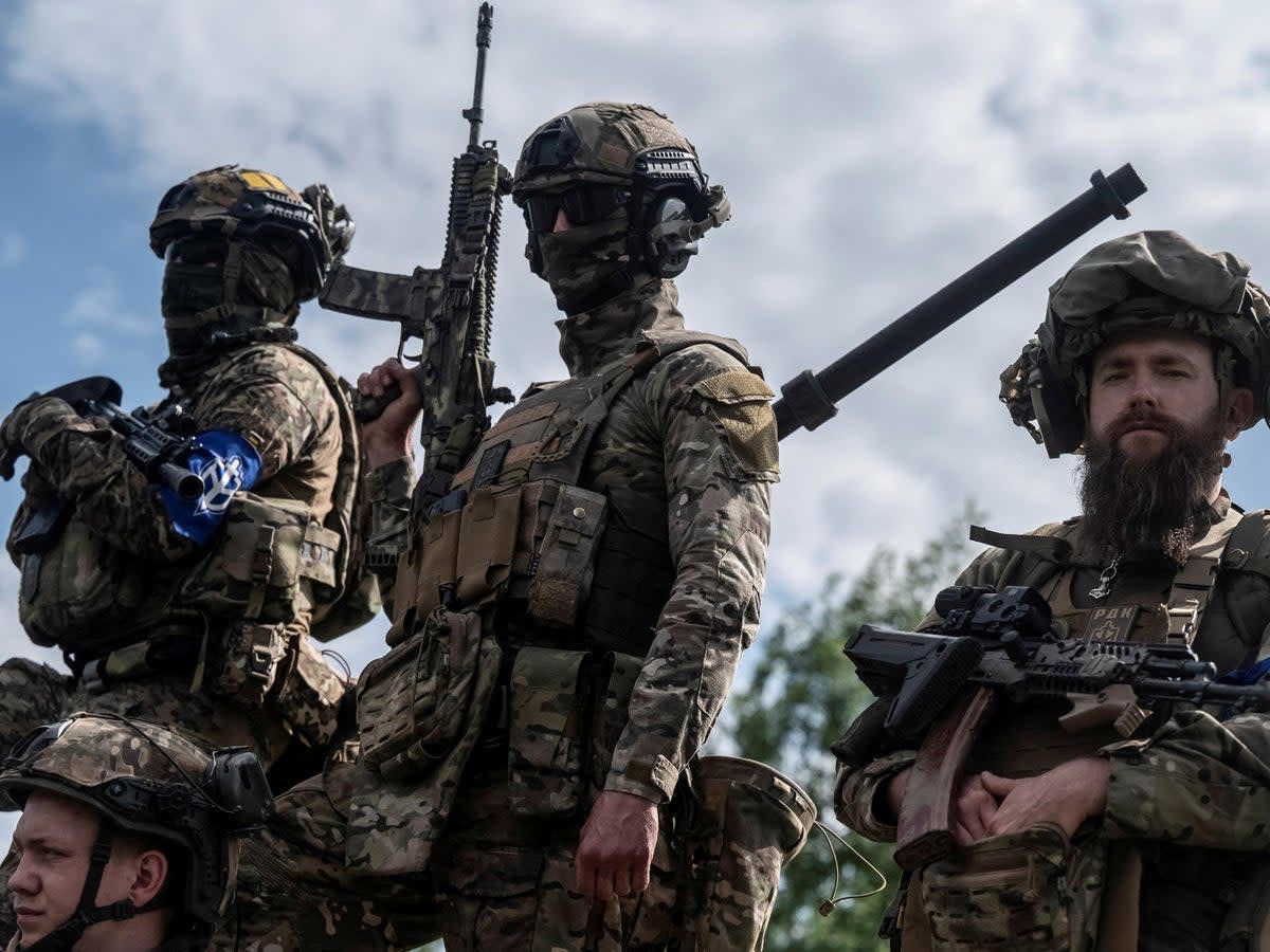 Members of the Russian Volunteer Corps in Ukraine, near the border with Russia  (Viacheslav Ratynskyi/Reuters)