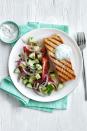 <p>Grilled salmon pairs perfectly with an herb salad and lemon tzatziki. </p><p><em><a href="https://www.womansday.com/food-recipes/food-drinks/recipes/a54835/grilled-salmon-with-greek-salad-recipe/" rel="nofollow noopener" target="_blank" data-ylk="slk:Get the Grilled Salmon with Greek Salad recipe.;elm:context_link;itc:0;sec:content-canvas" class="link ">Get the Grilled Salmon with Greek Salad recipe.</a></em></p>