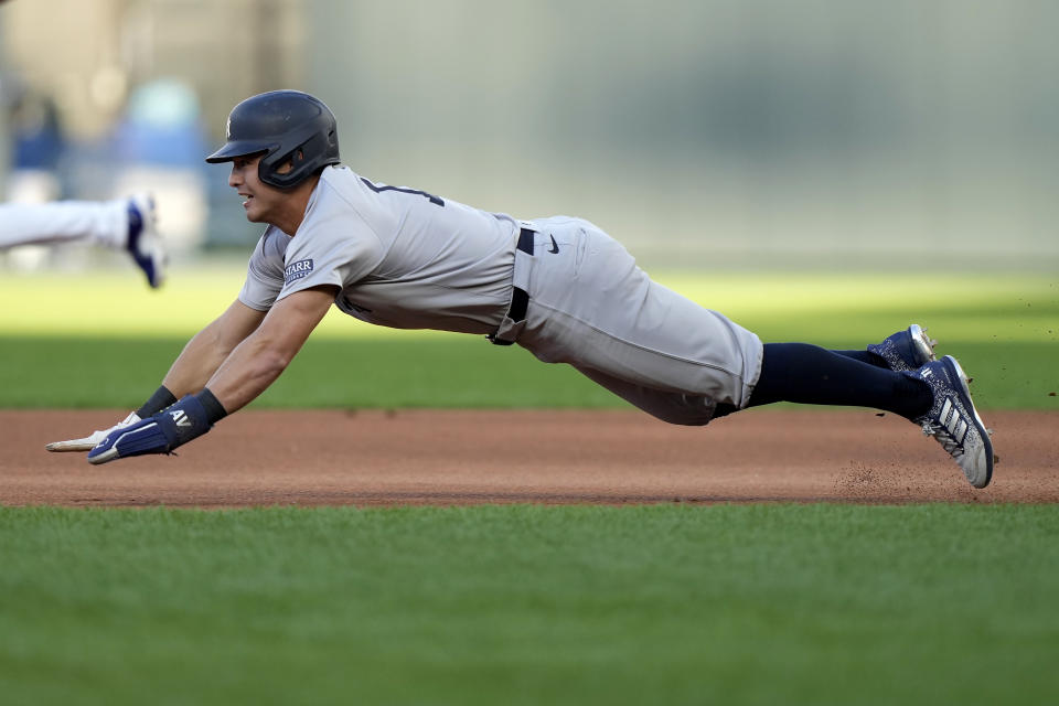 New York Yankees' Anthony Volpe steals second during the first inning of a baseball game against the New York Yankees Wednesday, June 12, 2024, in Kansas City, Mo. (AP Photo/Charlie Riedel)