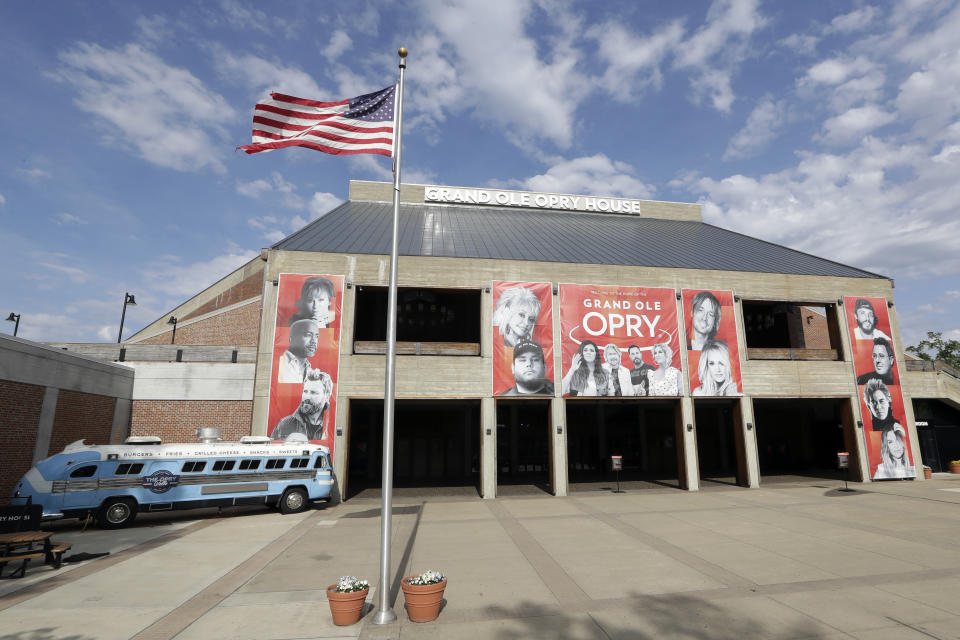 FILE - This April 28, 2020, photo shows the Grand Ole Opry House in Nashville, Tenn. The Grand Ole Opry, country music's most historic and storied stage, is getting heavy criticism for an appearance by Morgan Wallen. The country star's surprise performance has given many the impression that the institution has given the star its blessing and a path to reconciliation after he was caught on camera last year using a racial slur. (AP Photo/Mark Humphrey, File)