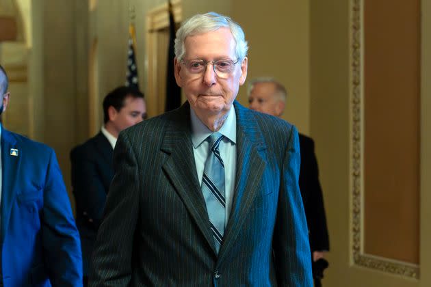 Senate Minority Leader Mitch McConnell (R-Ky.) walks to a Republican luncheon after announcing that he will step down as Senate Republican leader in November on Feb. 28.