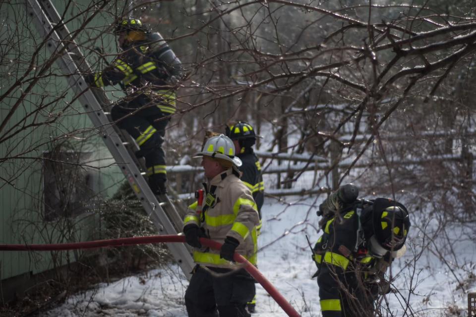 Firefighters from Sherborn and surrounding communities battled a blaze at 2 Ash Lane on Thursday afternoon. The cause has yet to be determined and Fire Chief Zack Ward said the home was likely a total loss.