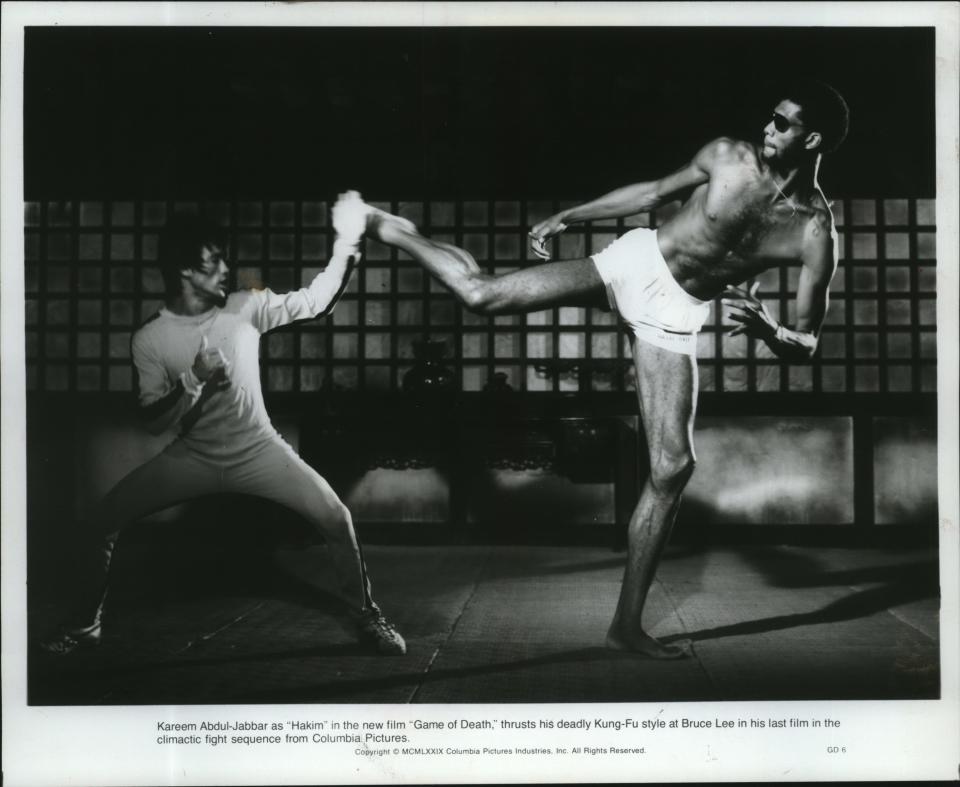 Kareem Abdul-Jabbar squares off with Bruce Lee in "Game of Death." The 1974 martial arts film was completed after Lee's death; out of respect for Lee, Abdul-Jabbar refused to shoot the additional footage with another actor, so producers used a double for him.