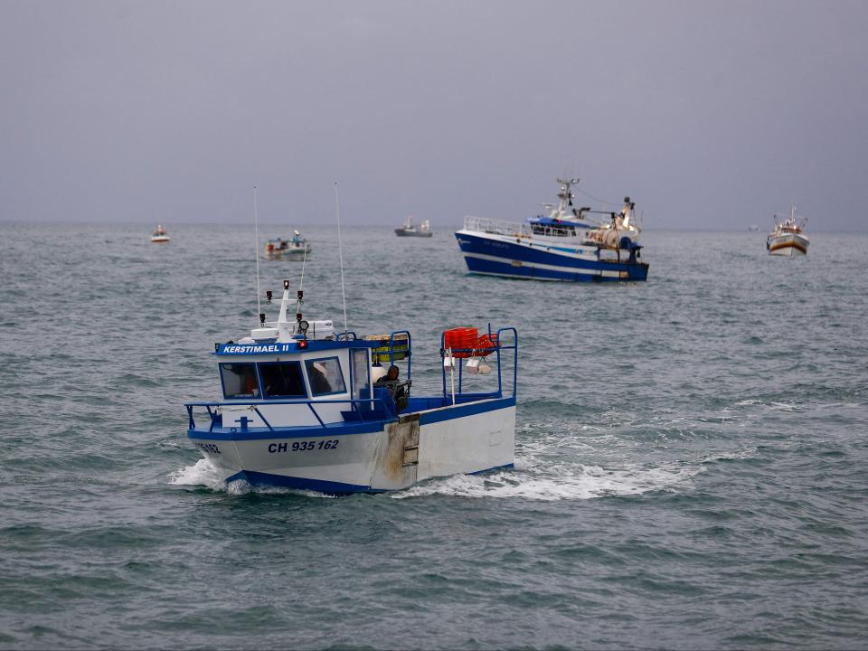 French fishing boats protest in front of the port of St Helier off the British island of Jersey to draw attention to what they see as unfair restrictions on their ability to fish in UK waters after Brexit on 6 May 2021 (Sameer Al-Doumy/AFP/Getty)