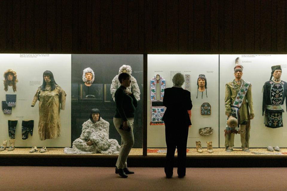 Visitors in New York on Thursday, Jan. 25, 2024, at the American Museum of Natural History’s Hall of Eastern Woodlands, which is being closed as the museum works to comply with new federal rules governing the holding and display of Native American cultural items.  (Jeenah Moon/The New York Times)