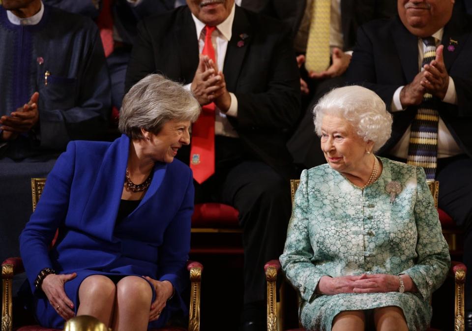 Theresa May sits with Queen Elizabeth on April 19, 2018 (Getty Images)