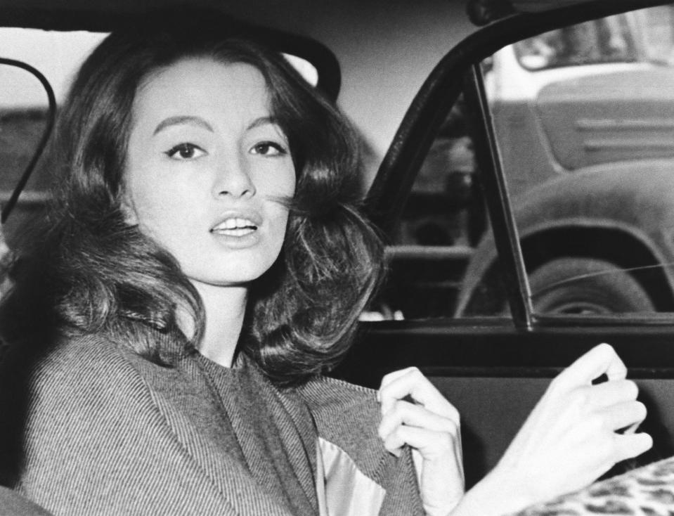 FILE - Christine Keeler, photographed in London in 1963. Britain’s upcoming general election on July 4, 2024, is widely expected to lead to a change of government for the first time in 14 years. In 1964, the Conservative Party had been in power for 13 years and was on its fourth prime minister. A sex scandal rocked the Conservative government and the British establishment, adding to the general feeling that the party had lost touch. Minister for war, John Profumo, resigned for lying to Parliament over his affair with model and show girl Christine Keeler. (AP Photo/File)