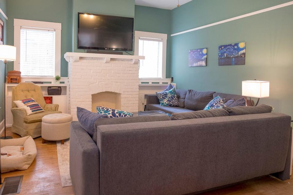 In the living room, comfort was important to create a livable environment for their family.