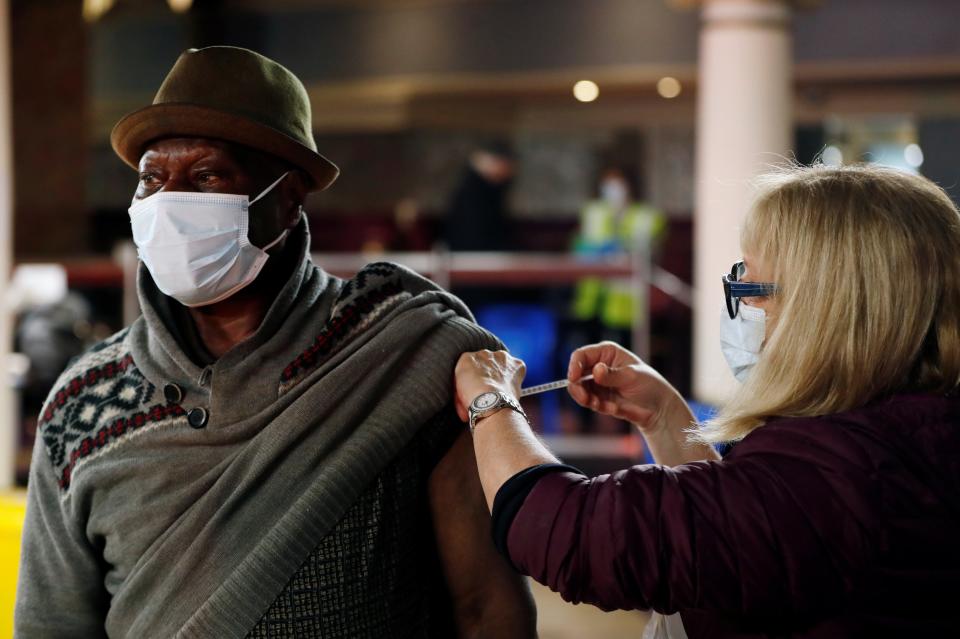 <p>Dr Winston Morgan, of the University of East London, said that, despite opinion polls suggesting that up to 72 per cent of black people would shun a jab, there was “no evidence” of vaccines being refused in practice</p> (REUTERS)