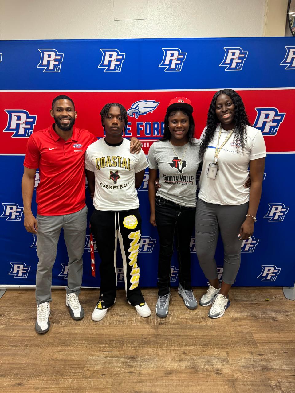 Pine Forest basketball standouts Maurice Smith (second from left) and Niylia Wilkins (second from right) both signed to play college basketball. Smith is headed to Coastal Alabama North and Wilkins will play at Trinity Valley Community College.