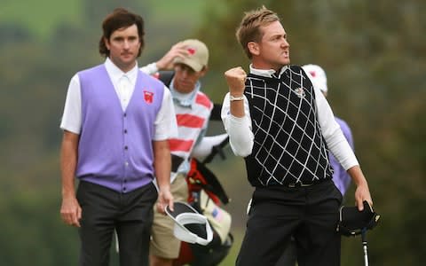 Bubba Watson is dejected while Ian Poulter rejoices - Credit: Getty Images