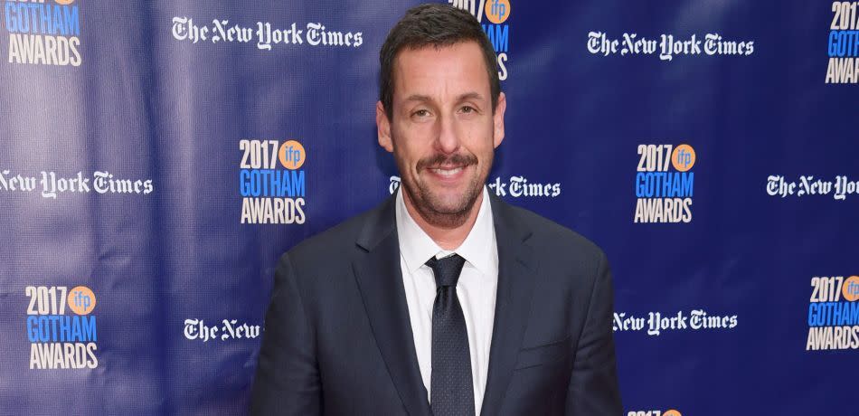 Adam Sandler took time to pose with fans in their wedidng photos.