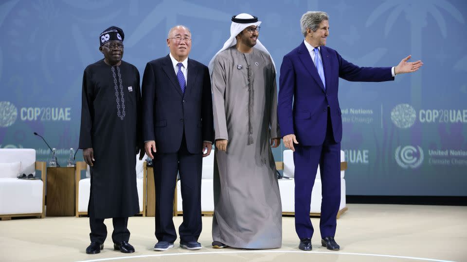 From left, Bola Tinubu, Nigeria's president; Xie Zhenhua, China's special envoy for climate change; COP28 President Sultan Al Jaber; and John Kerry, US special presidential envoy for climate, on Saturday at the climate summit in Expo City in Dubai. - Hollie Adams/Bloomberg/Getty Images