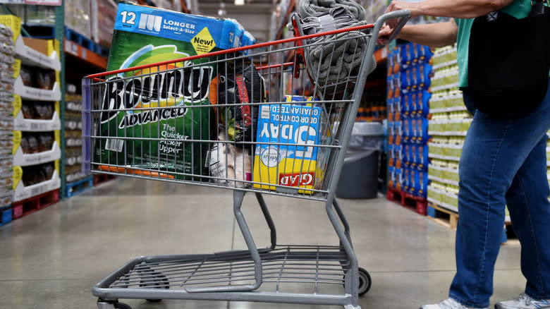 Shopper with full cart at Costco