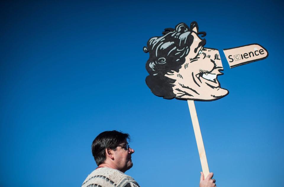 Scott McBride, of Nanaimo, B.C., holds a caricature of Prime Minister Justin Trudeau during a protest against the Kinder Morgan Trans Mountain pipeline expansion in Burnaby, B.C., on Saturday March 10, 2018. Indigenous leaders are calling on people to raise their voices Saturday to stop a $7.4 billion pipeline expansion project that pumps oil from Canada's tar sands to the Pacific Coast. The Trans Mountain pipeline expansion by the Canadian division of Texas-based Kinder Morgan would nearly triple the flow of oil from Alberta's tar sands to the Vancouver area and dramatically increase the number of oil tankers travelling the shared waters between Canada and Washington state.