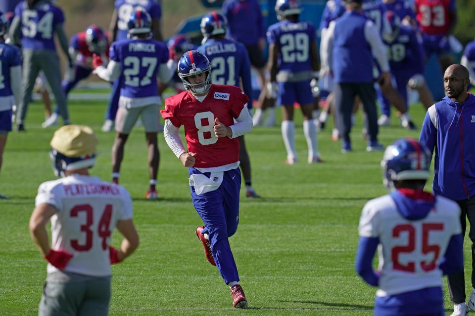 New York Giants quarterback Daniel Jones (8) attends a practice session at Hanbury Manor in Ware, England