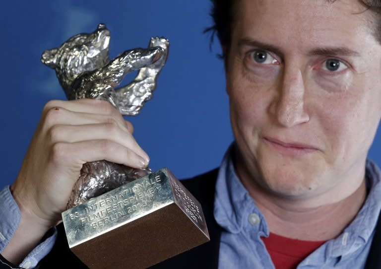 US director David Gordon Green holds the Silver Bear best director award for "Prince Avalanche" at the Berlin film festival on February 16, 2013. The comedy stars Paul Rudd and Emile Hirsch as highway maintenance workers in Texas at crossroads in their lives