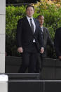 Tesla CEO Elon Musk arrives at U.S. District Court Wednesday, Dec. 4, 2019, in Los Angeles. Musk is going on trial for his troublesome tweets in a case pitting the billionaire against a British diver he allegedly dubbed a pedophile. (AP Photo/Mark J. Terrill)